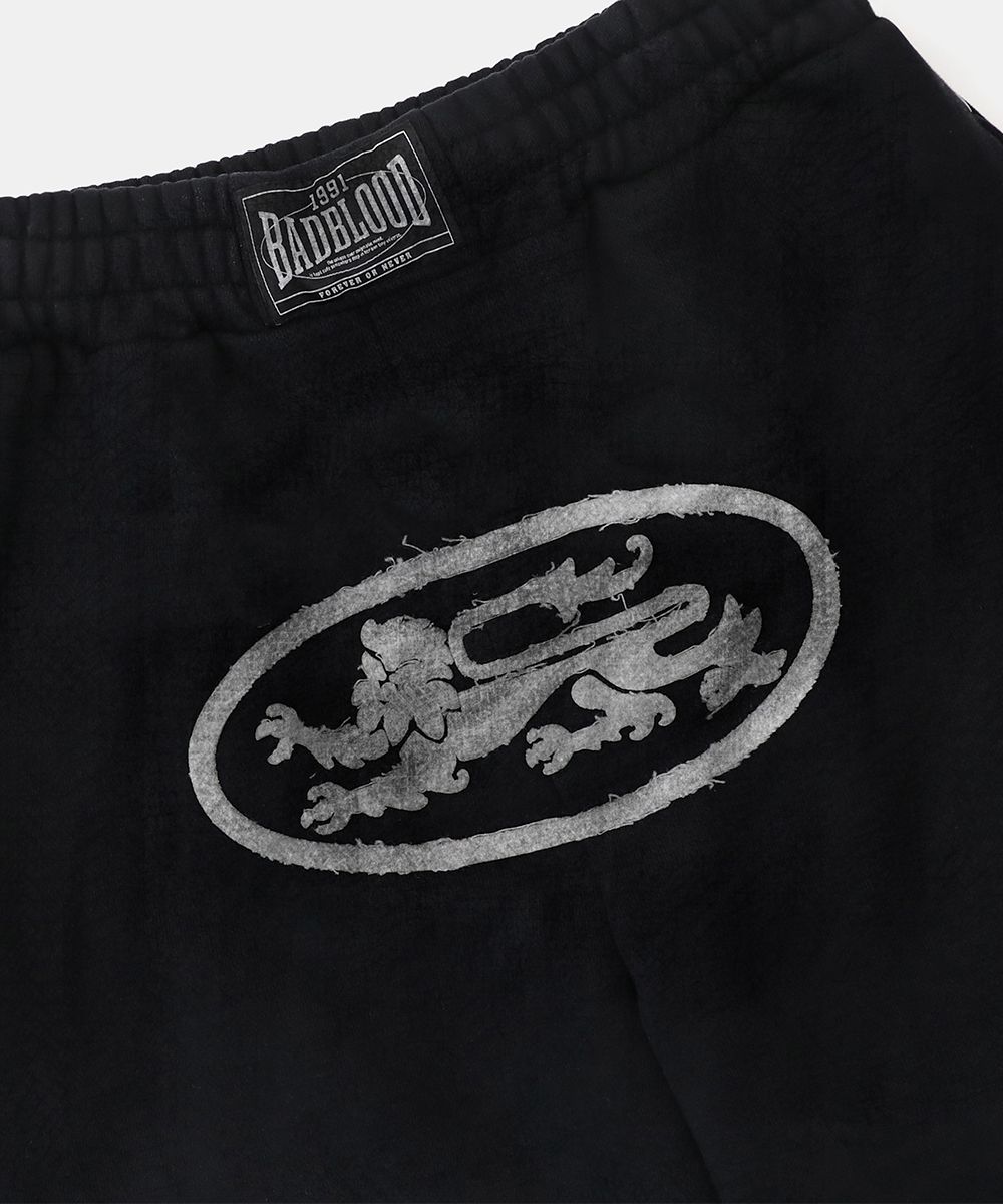 MUSINSA | BADBLOOD Lion Patch 2 Way Curved Jogger - Washed Black