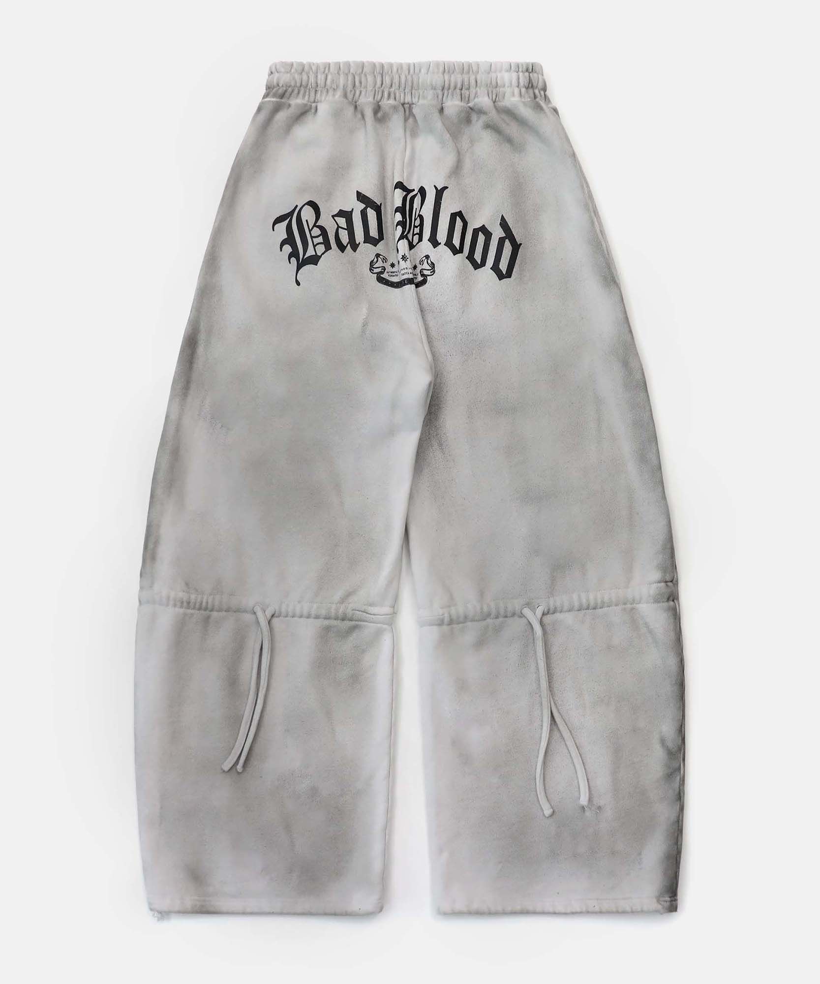 MUSINSA | BADBLOOD Lion Patch 2 Way Curved Jogger - Washed White