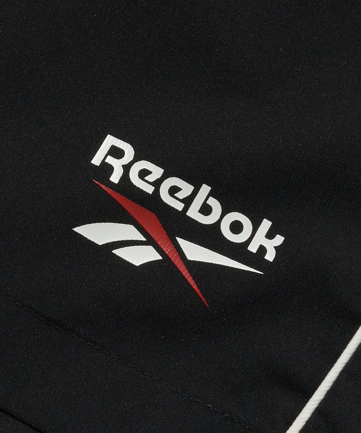 리복(REEBOK) 리바이벌 스트레치 쇼츠 - 블랙