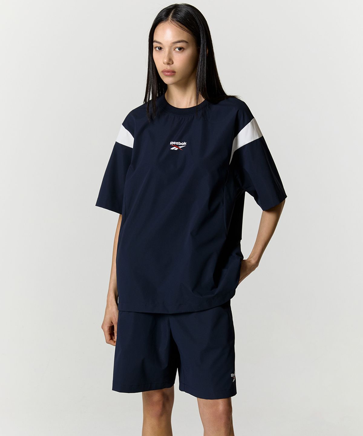 리복(REEBOK) 리바이벌 스트레치 쇼츠 - 네이비