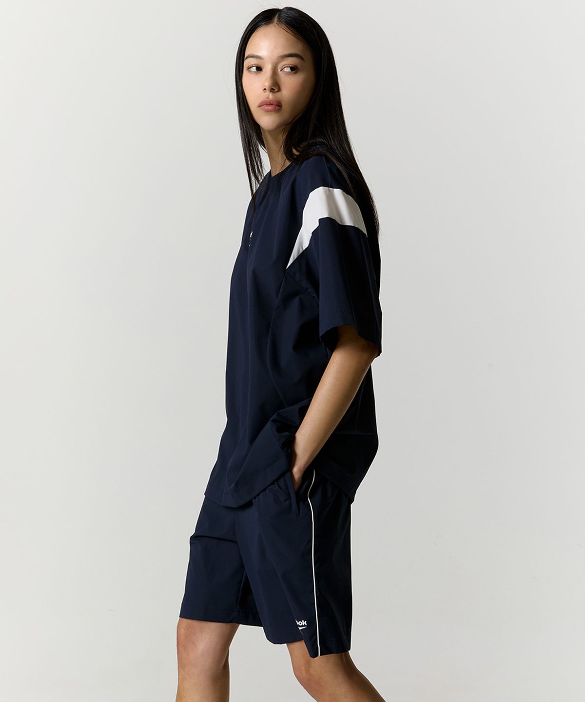 리복(REEBOK) 리바이벌 스트레치 쇼츠 - 네이비