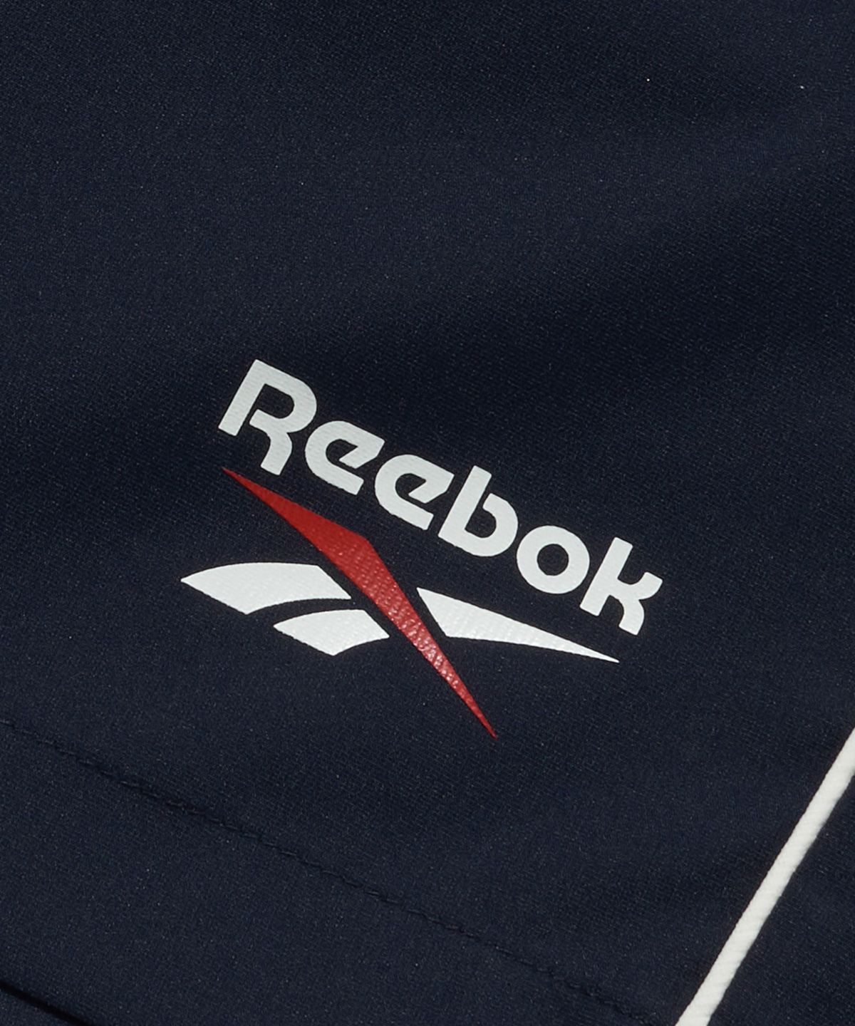 리복(REEBOK) 리바이벌 스트레치 쇼츠 - 네이비