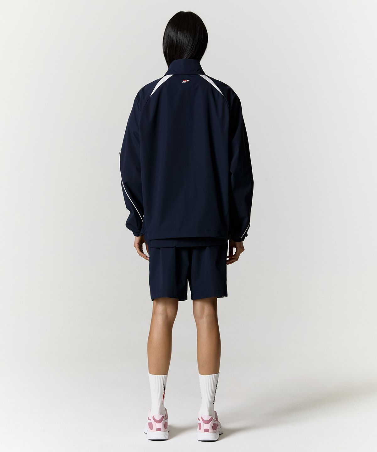 리복(REEBOK) 리바이벌 스트레치 윈드 브레이커 - 네이비