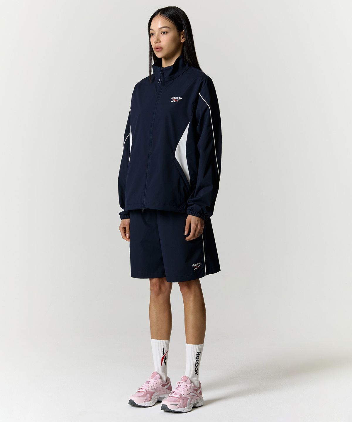리복(REEBOK) 리바이벌 스트레치 윈드 브레이커 - 네이비