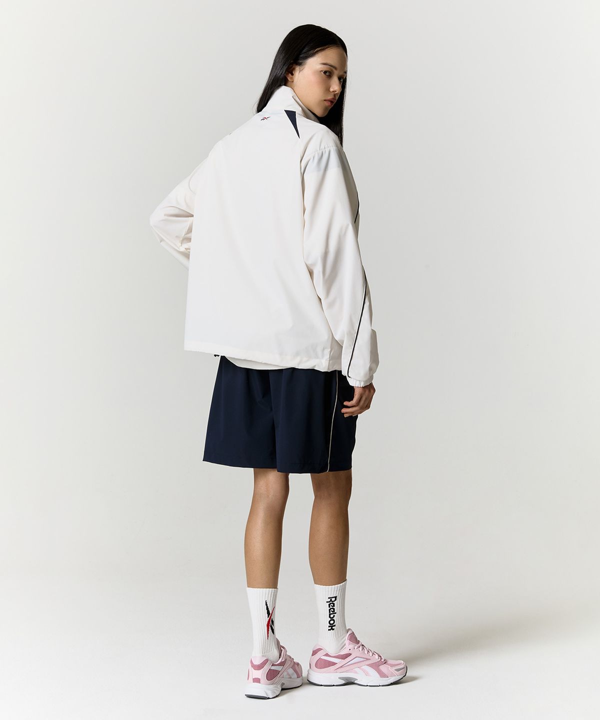 리복(REEBOK) 리바이벌 스트레치 윈드 브레이커 - 화이트