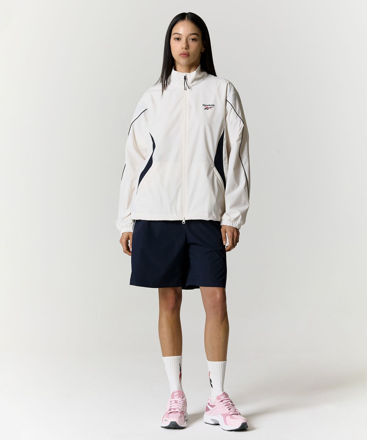 리복(REEBOK) 리바이벌 스트레치 윈드 브레이커 - 화이트
