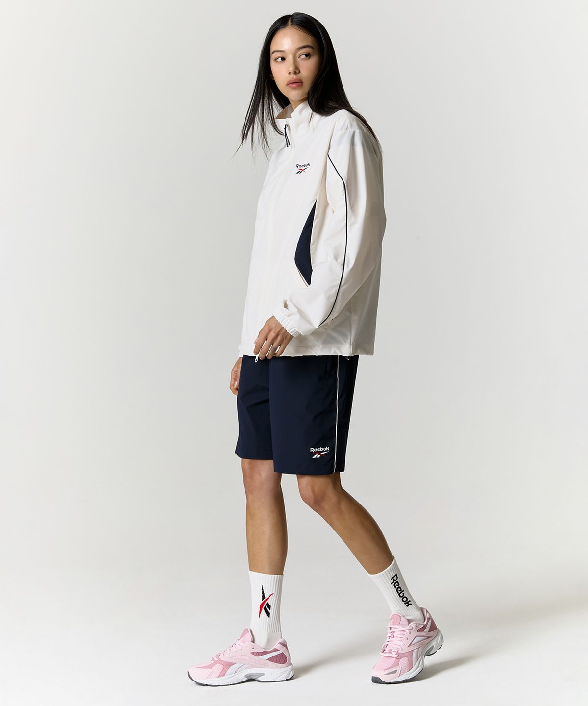 리복(REEBOK) 리바이벌 스트레치 윈드 브레이커 - 화이트