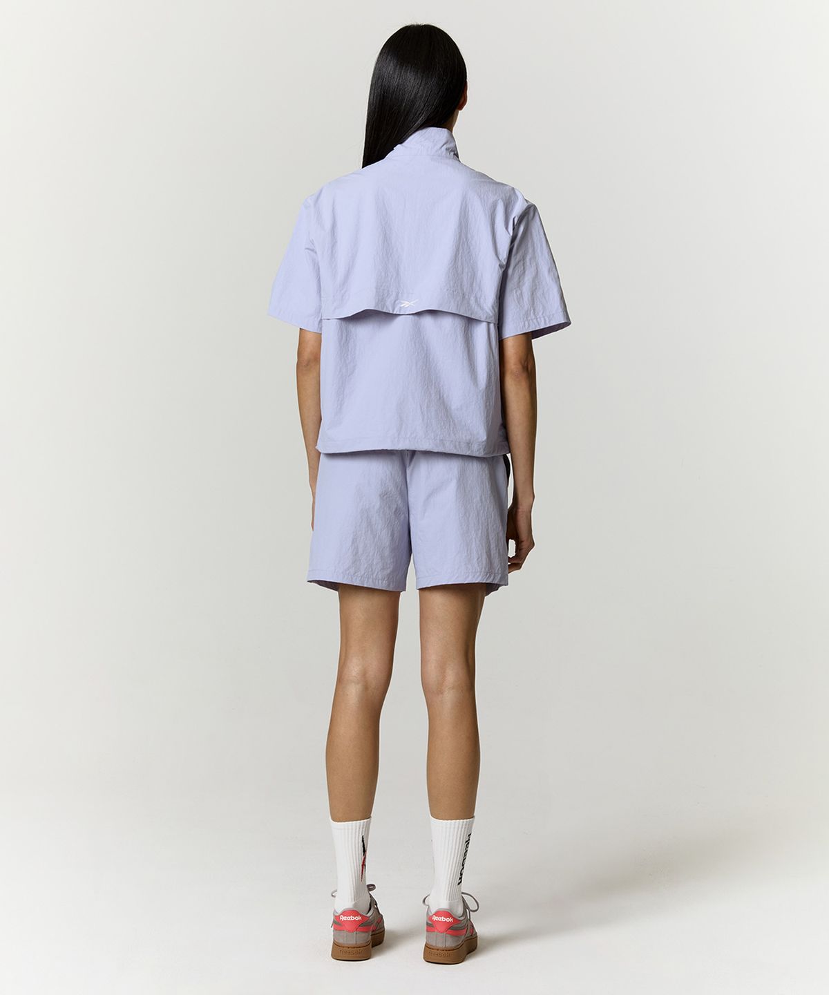 리복(REEBOK) 에센셜 우븐 쇼츠  (W) - 라벤더