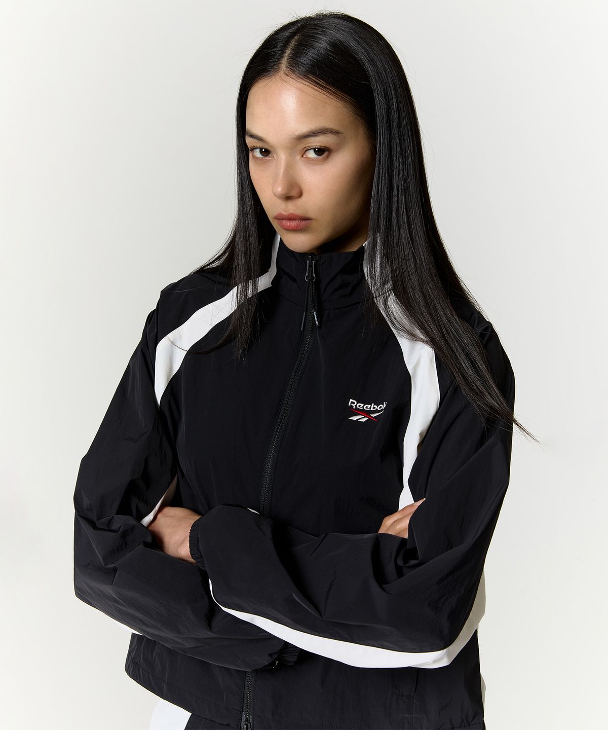 리복(REEBOK) 일립스 크롭 윈드 브레이커 (W) - 블랙