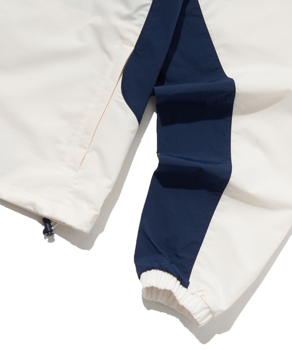 리복(REEBOK) 일립스 크롭 윈드 브레이커 (W) - 화이트:네이비
