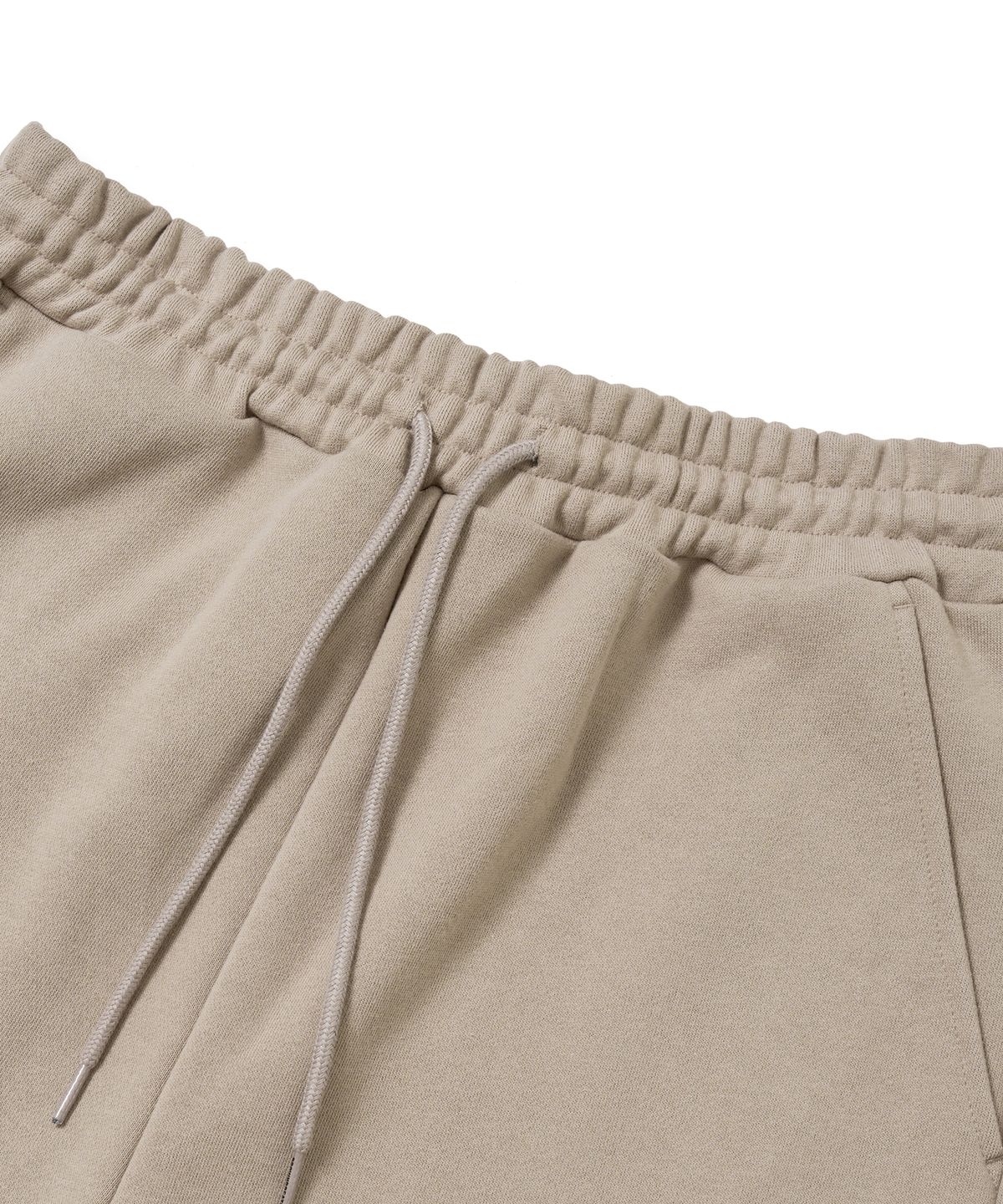 브라운브레스(BROWNBREATH) TAG SWEAT PANTS - BEIGE