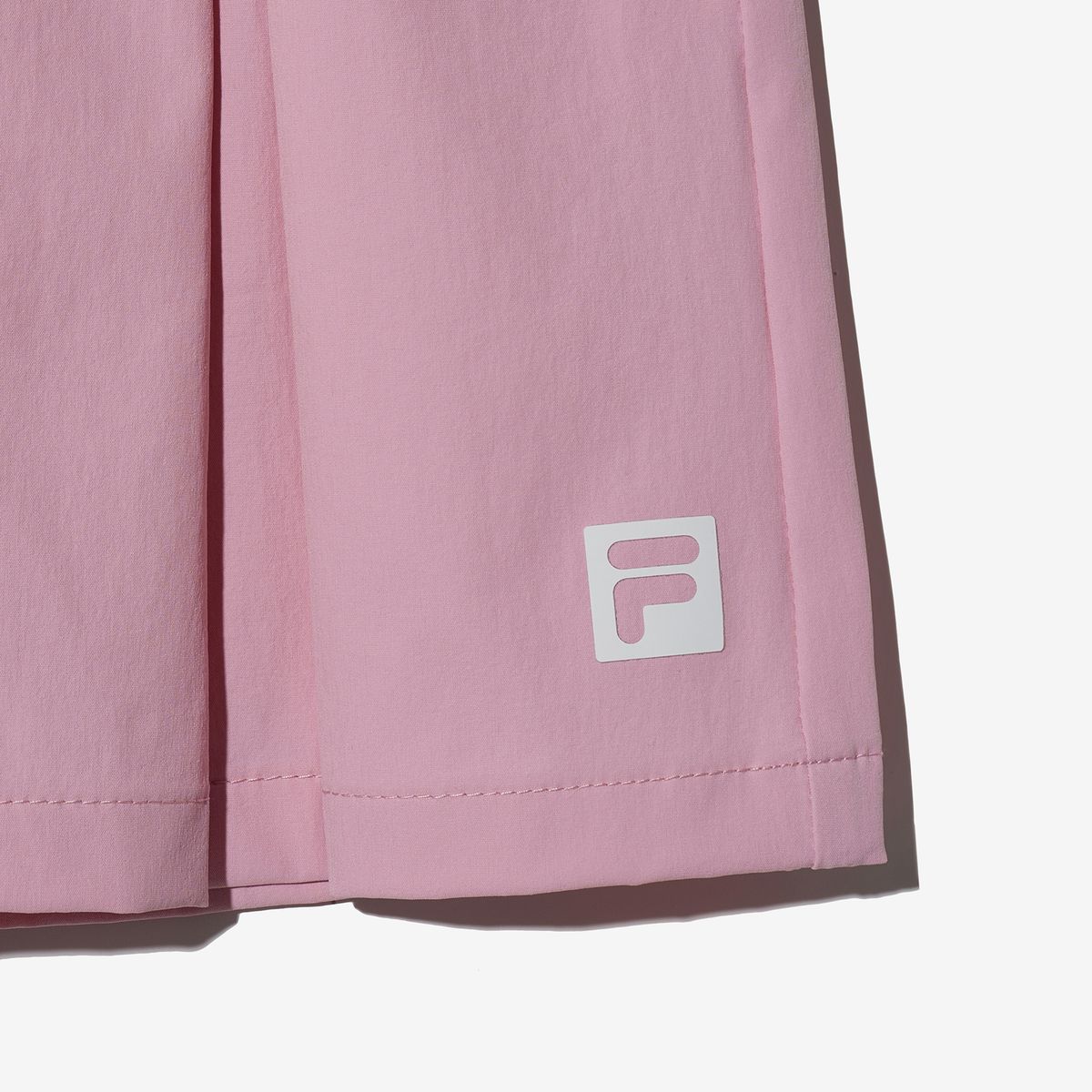 휠라 키즈(FILA KIDS) 우븐 플리츠 큐롯 팬츠