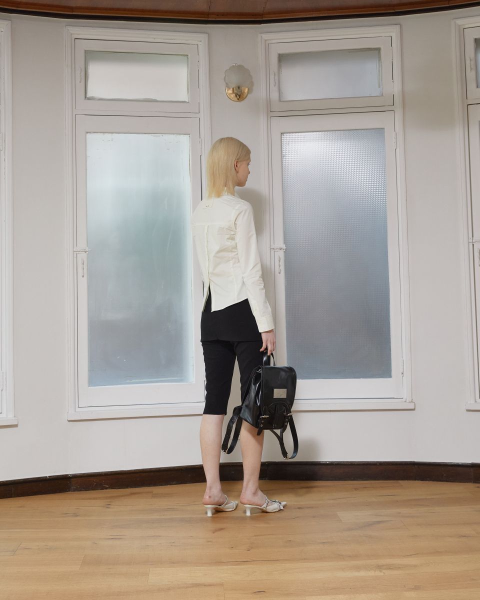 MUSINSA | MATIN KIM BUCKLE DETAIL BACK PACK IN BLACK