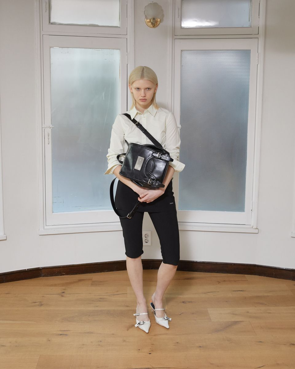 MUSINSA | MATIN KIM BUCKLE DETAIL BACK PACK IN BLACK