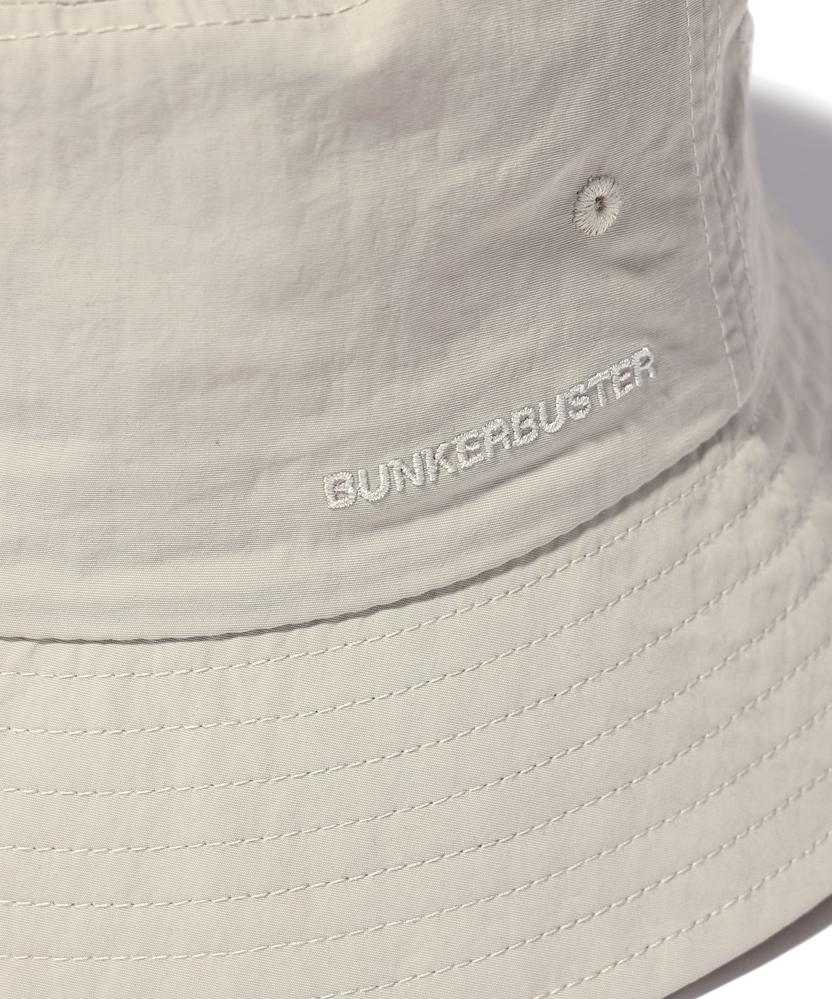 벙커버스터(BUNKERBUSTER) 로고 버킷햇 LIGHT BEIGE (MQ5GU594-004)