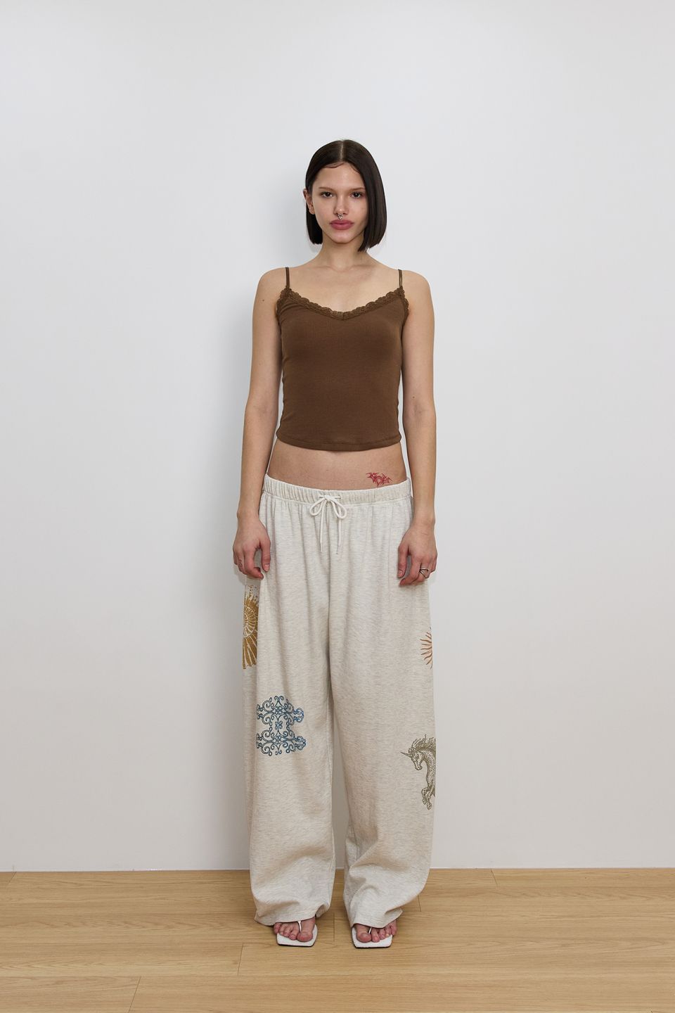 MUSINSA | TOOMUCHTAX TAROT WAFFLE PANTS (IVORY)