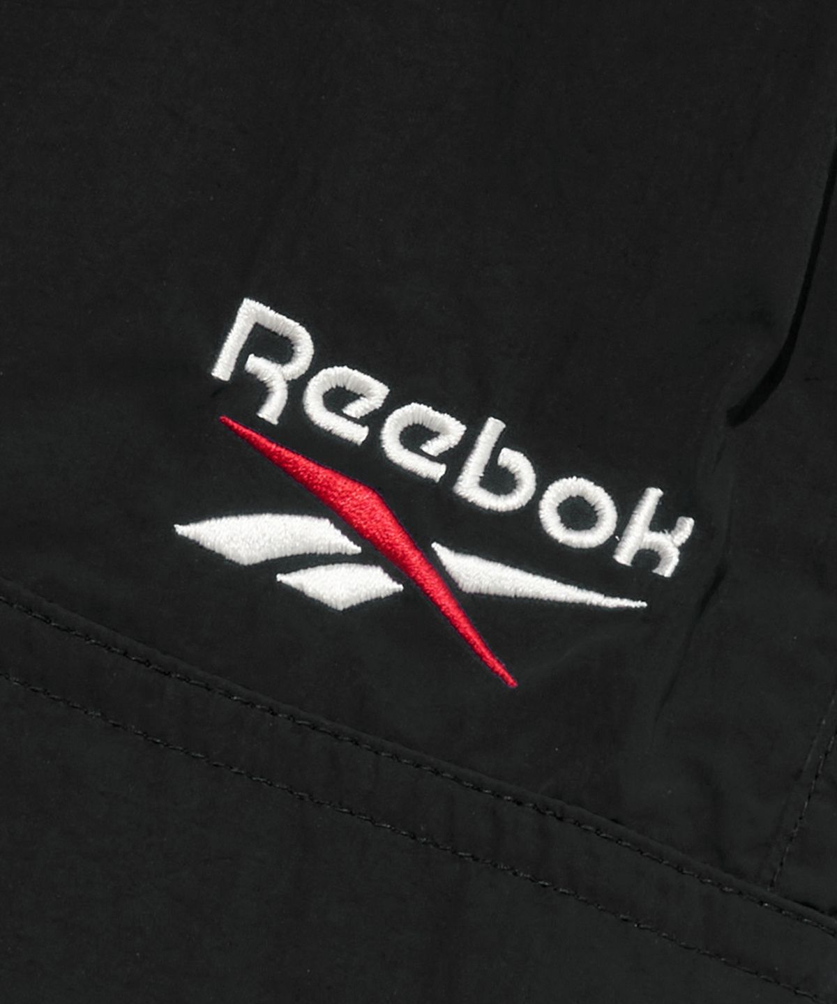 리복(REEBOK) 일립스 포켓 쇼츠 - 블랙