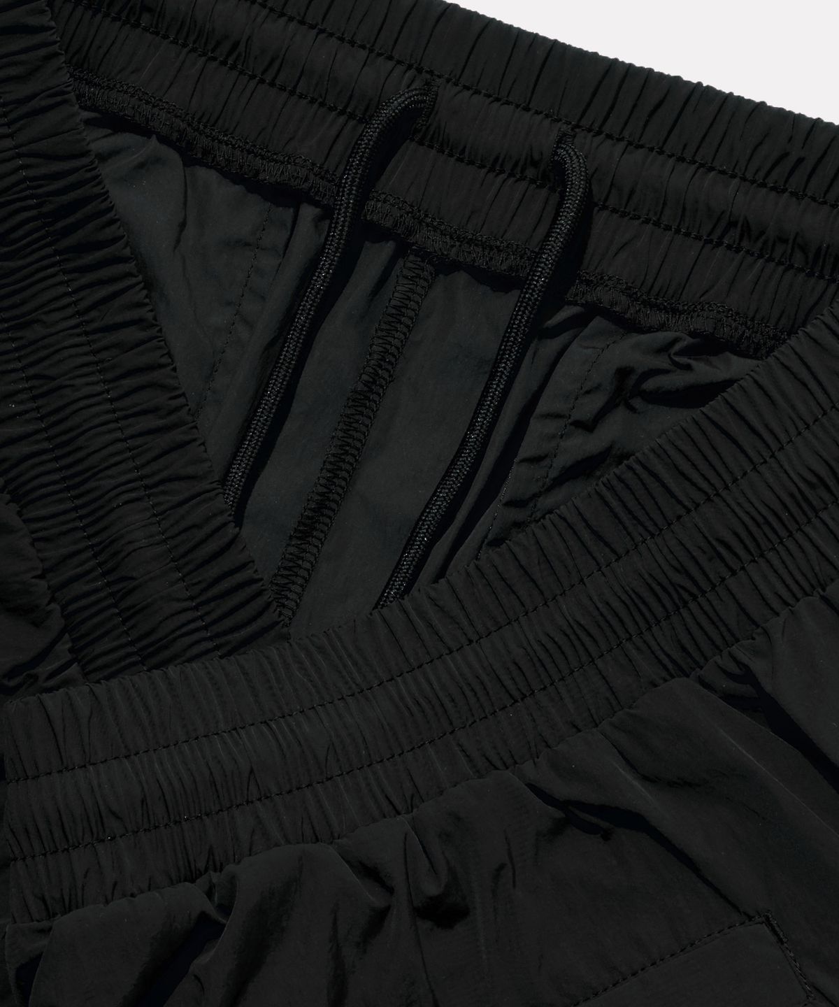리복(REEBOK) 일립스 포켓 쇼츠 - 블랙