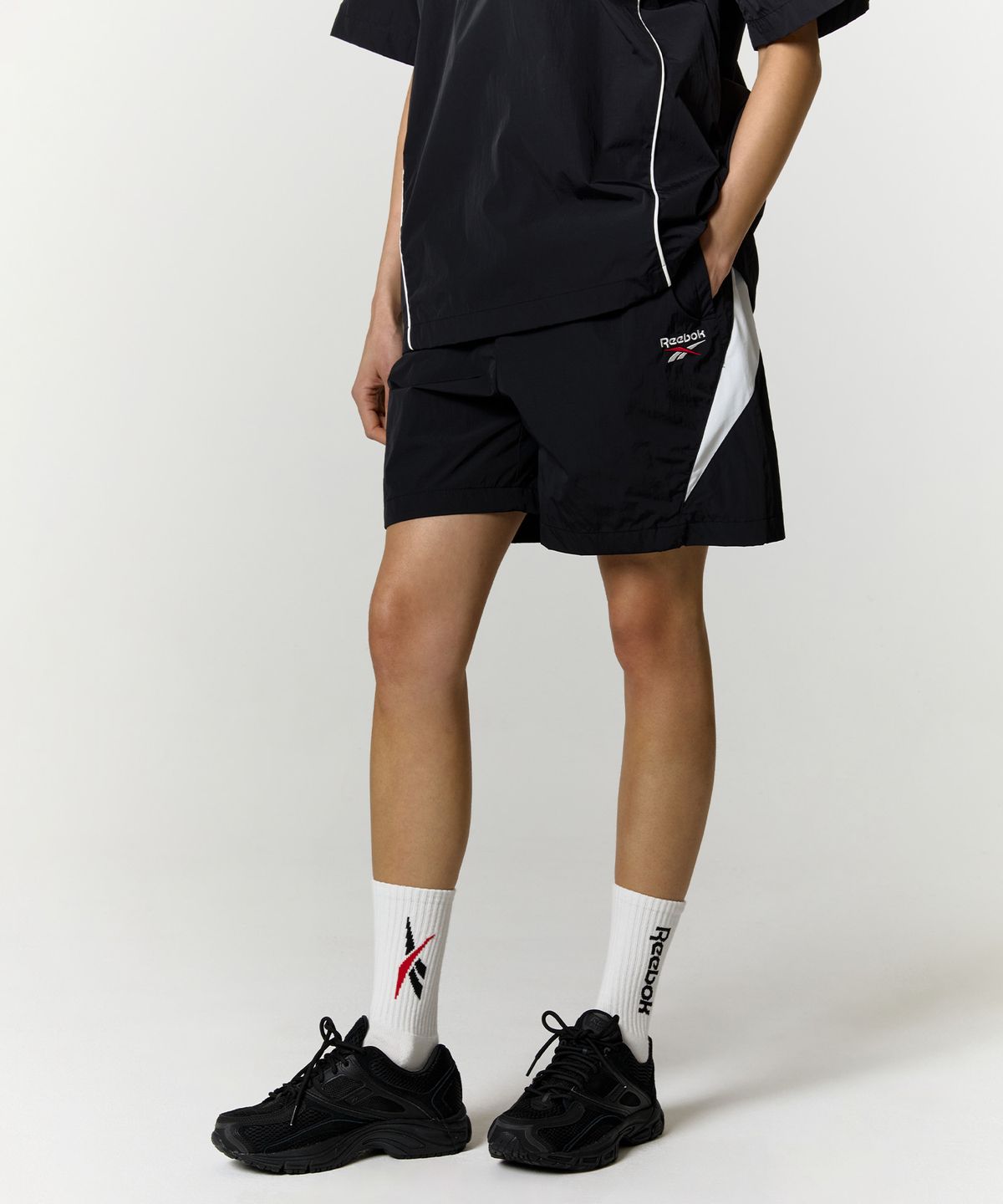 리복(REEBOK) 일립스 쇼츠 - 블랙