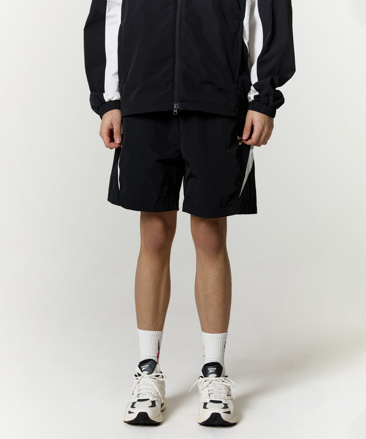 리복(REEBOK) 일립스 쇼츠 - 블랙