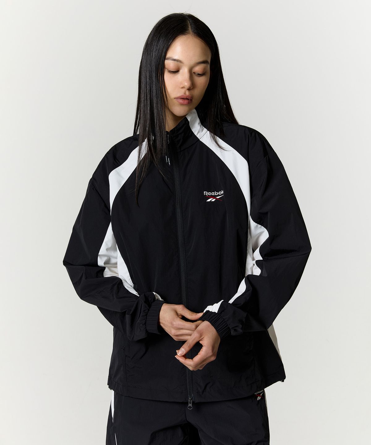 리복(REEBOK) 일립스 윈드 브레이커 - 블랙