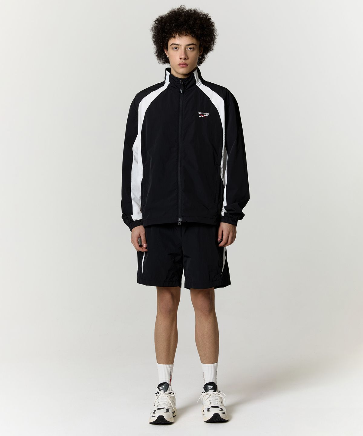 리복(REEBOK) 일립스 윈드 브레이커 - 블랙