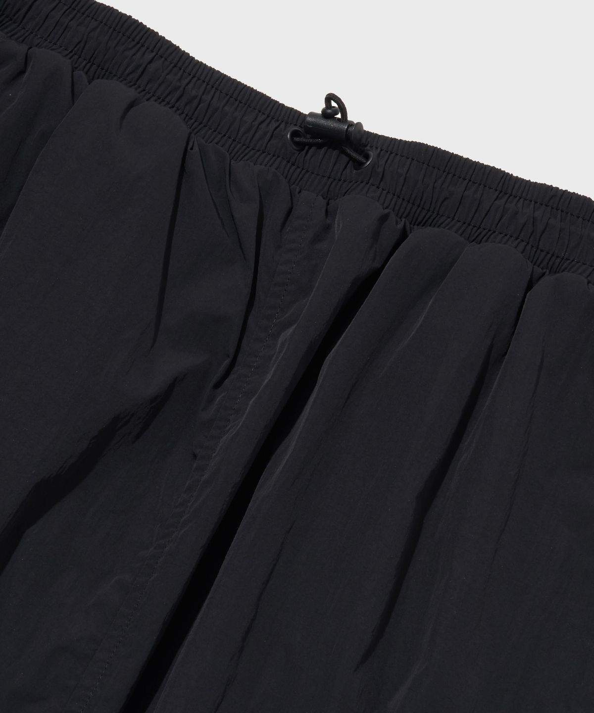 리복(REEBOK) 일립스 파라슈트 스커트 (W) - 블랙