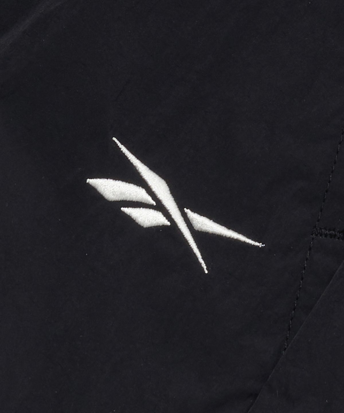 리복(REEBOK) 일립스 파라슈트 스커트 (W) - 블랙