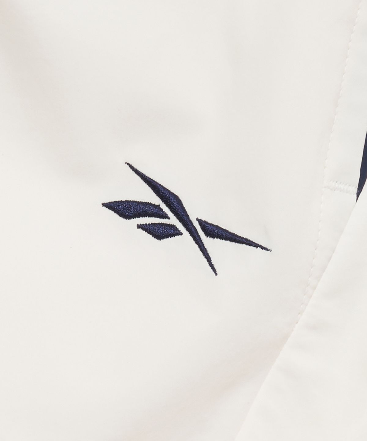 리복(REEBOK) 일립스 파라슈트 스커트 (W) - 화이트