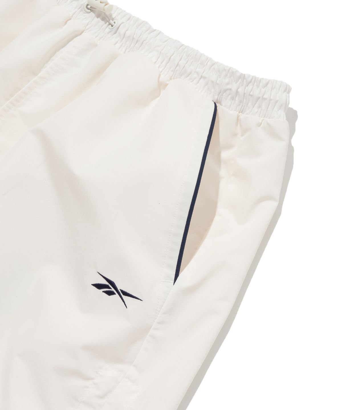 리복(REEBOK) 일립스 파라슈트 스커트 (W) - 화이트
