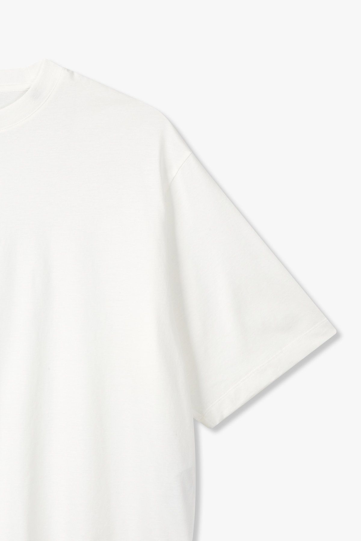 아르마니 익스체인지(ARMANI EXCHANGE) 남성 사이드 슬릿 오버 핏 티셔츠 _화이트 A415130028