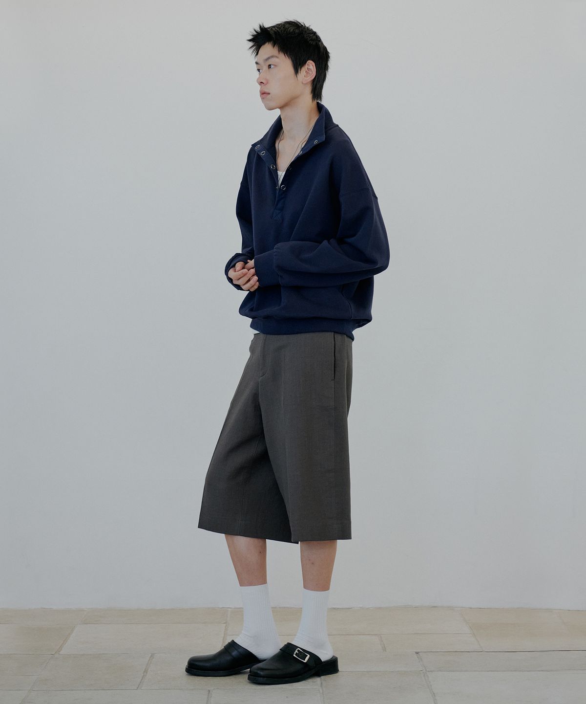 누아클레(NUAKLE) 하프넥 스냅 스웻 셔츠_네이비