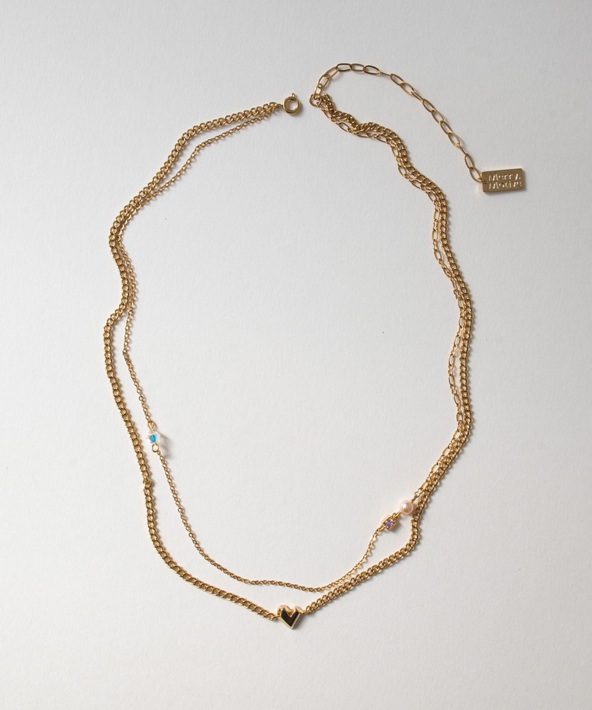 메리모티브(MERRYMOTIVE) Unique heart mix chain layered gold necklace