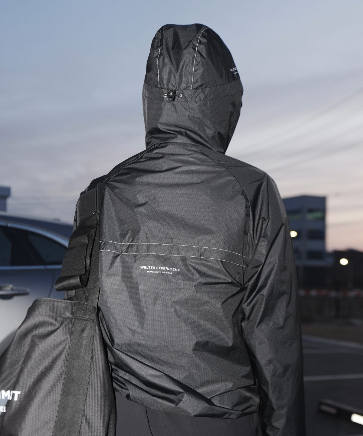 웰터 익스페리먼트(WELTER EXPERIMENT) ANEMOI LIGHT WINDBREAKER_BLACK