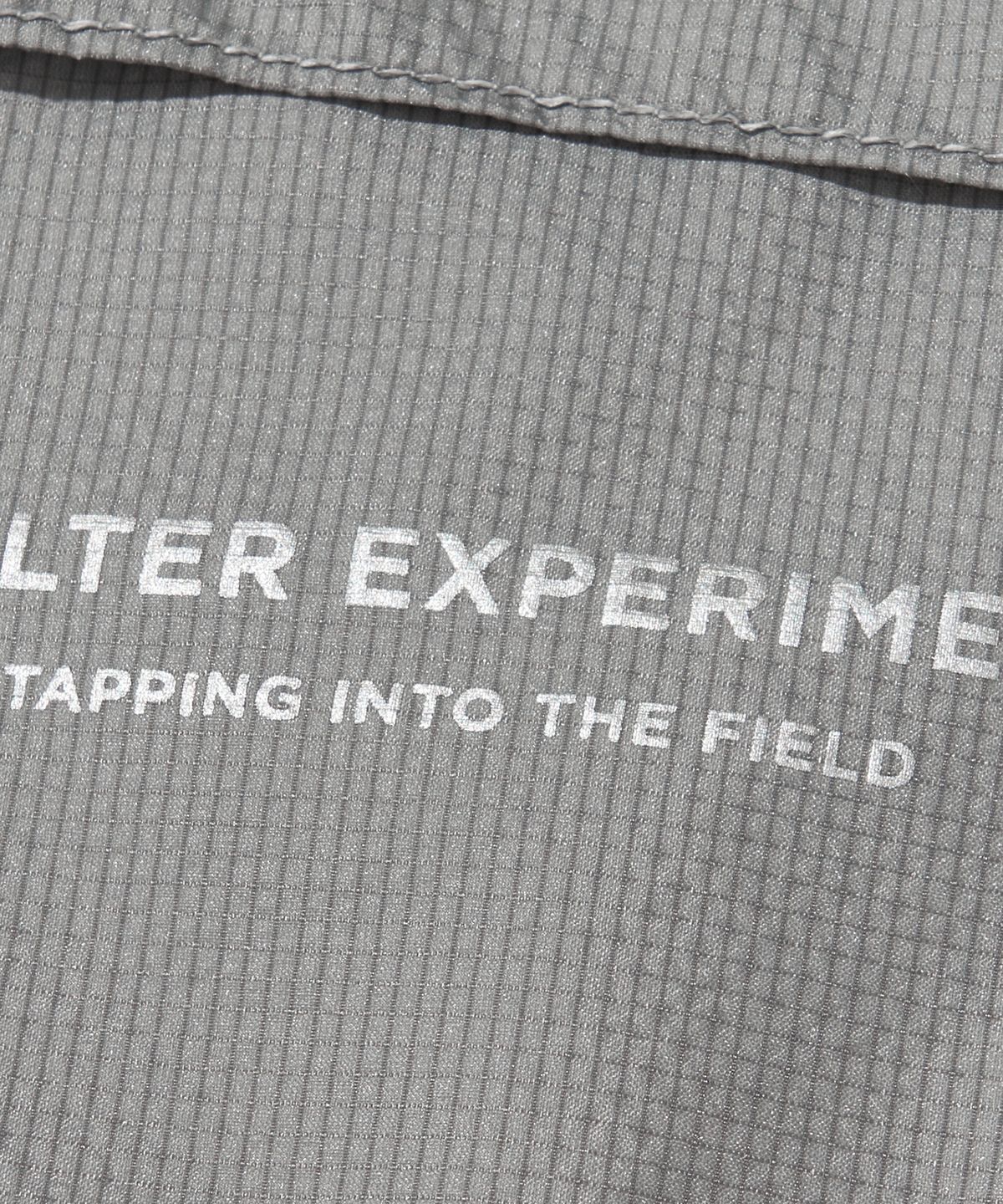 웰터 익스페리먼트(WELTER EXPERIMENT) ANEMOI LIGHT WINDBREAKER_GRAY
