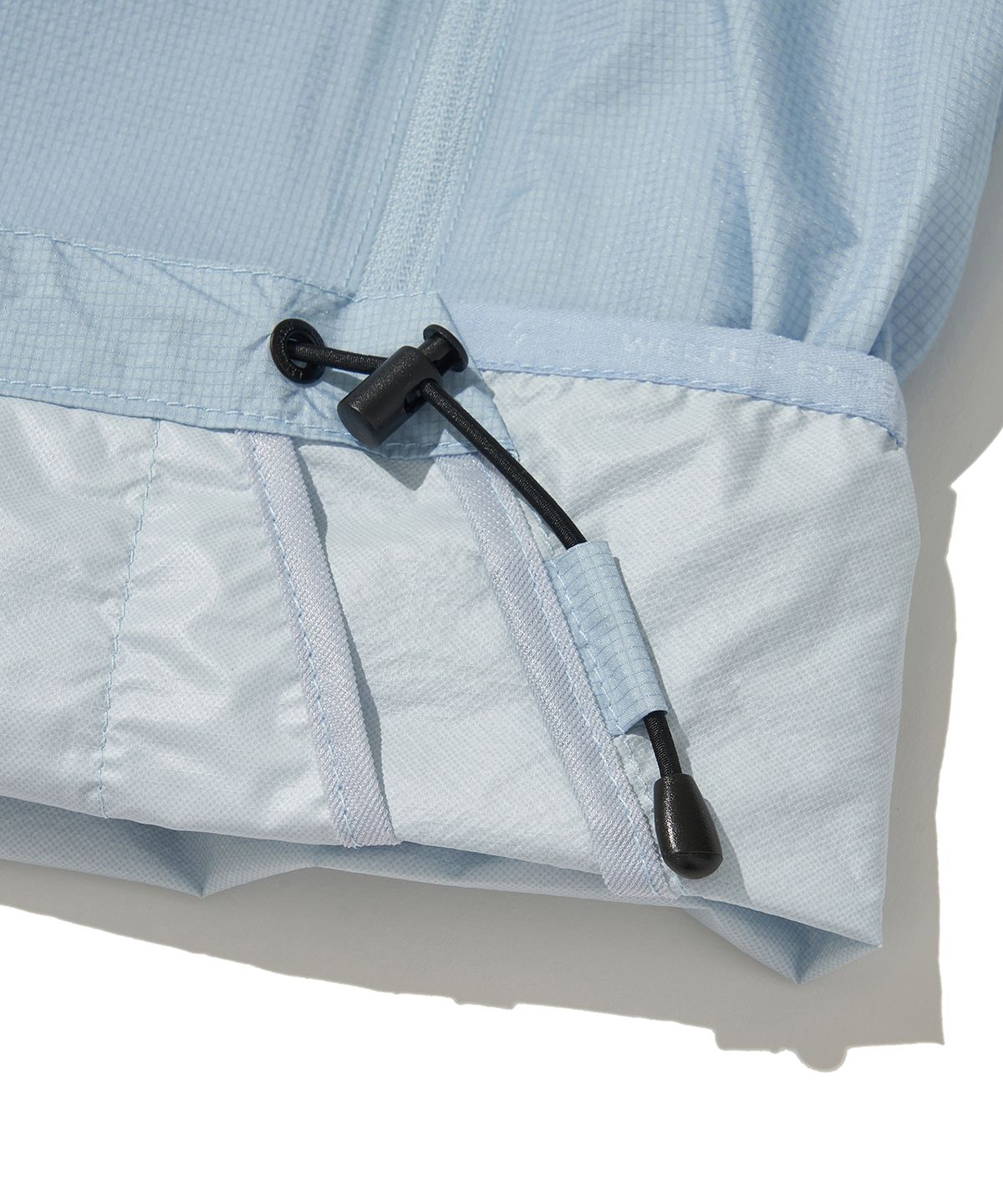 웰터 익스페리먼트(WELTER EXPERIMENT) ANEMOI LIGHT WINDBREAKER_SKY BLUE