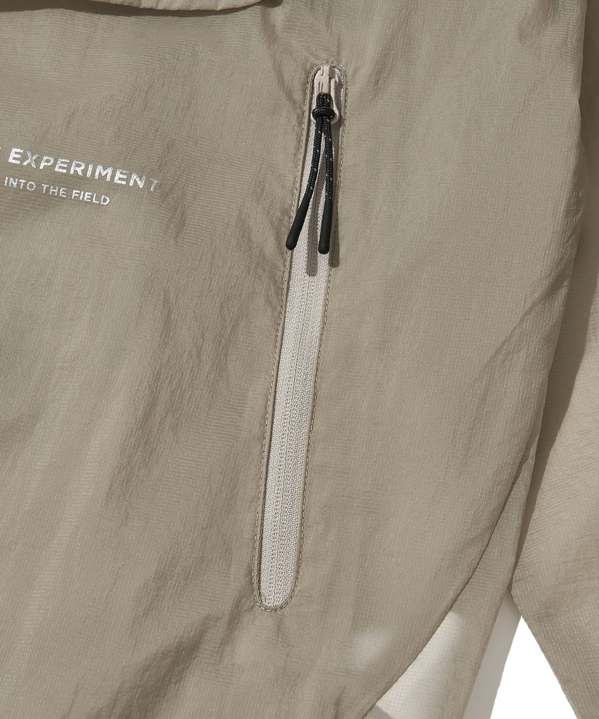 웰터 익스페리먼트(WELTER EXPERIMENT) NIMBUS AEROPACK WINDBREAKER_LIGHT GRAY