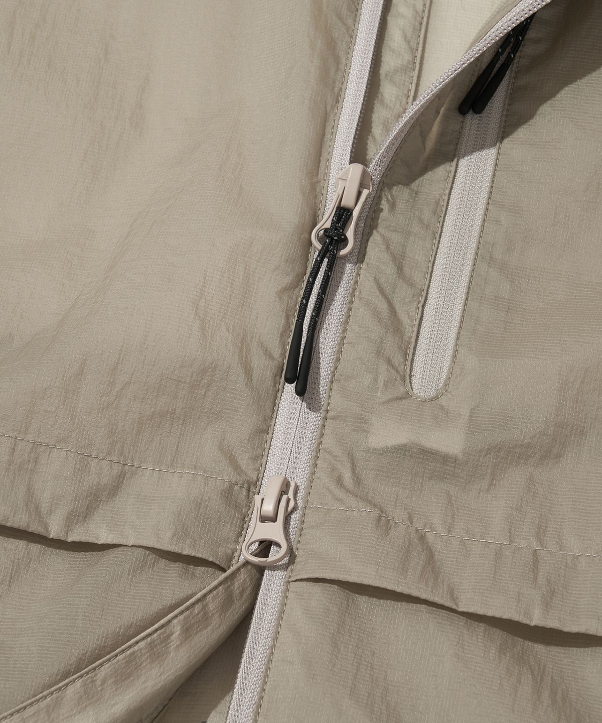 웰터 익스페리먼트(WELTER EXPERIMENT) NIMBUS AEROPACK WINDBREAKER_LIGHT GRAY