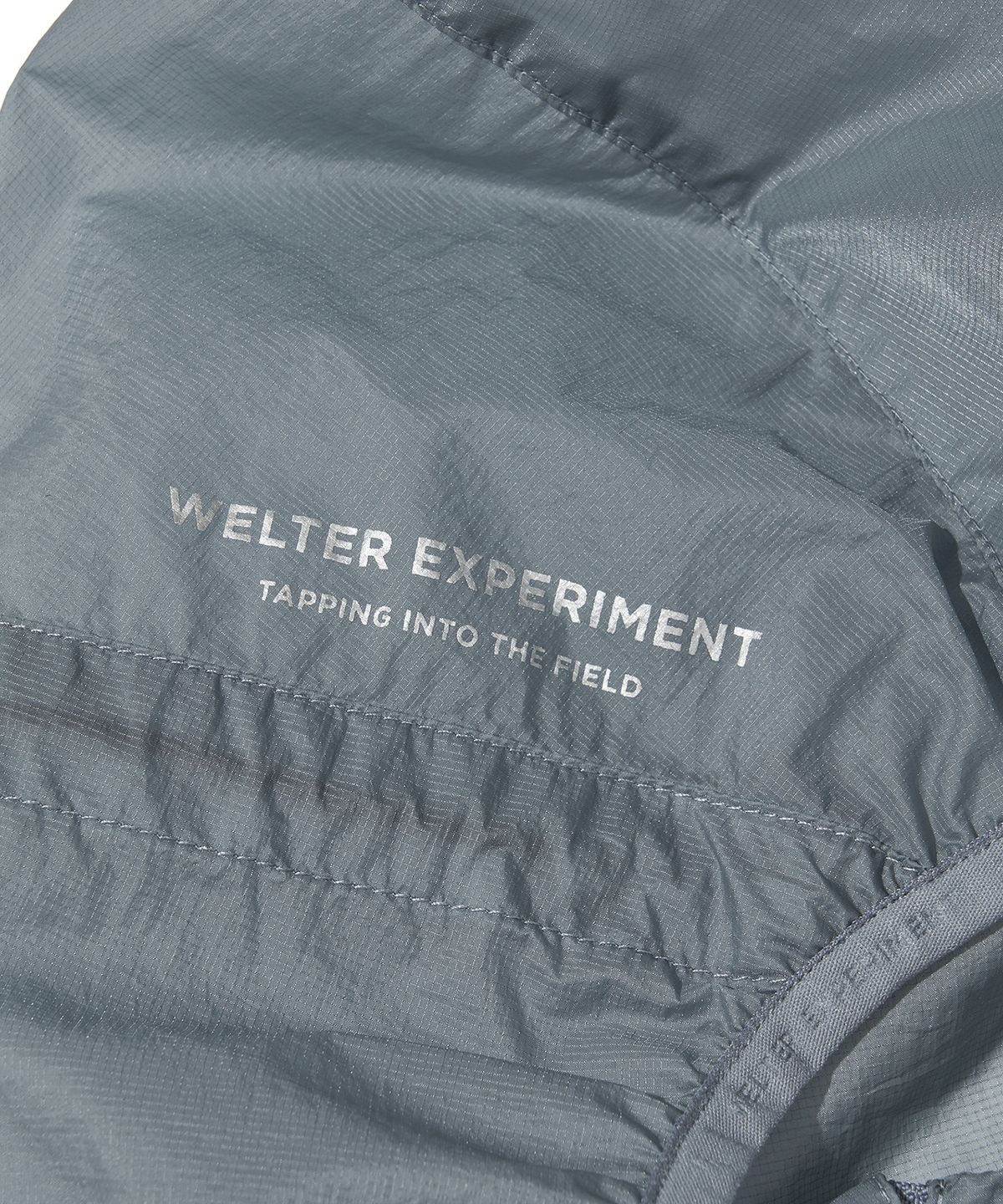 웰터 익스페리먼트(WELTER EXPERIMENT) NIMBUS AEROPACK WINDBREAKER_SKY BLUE