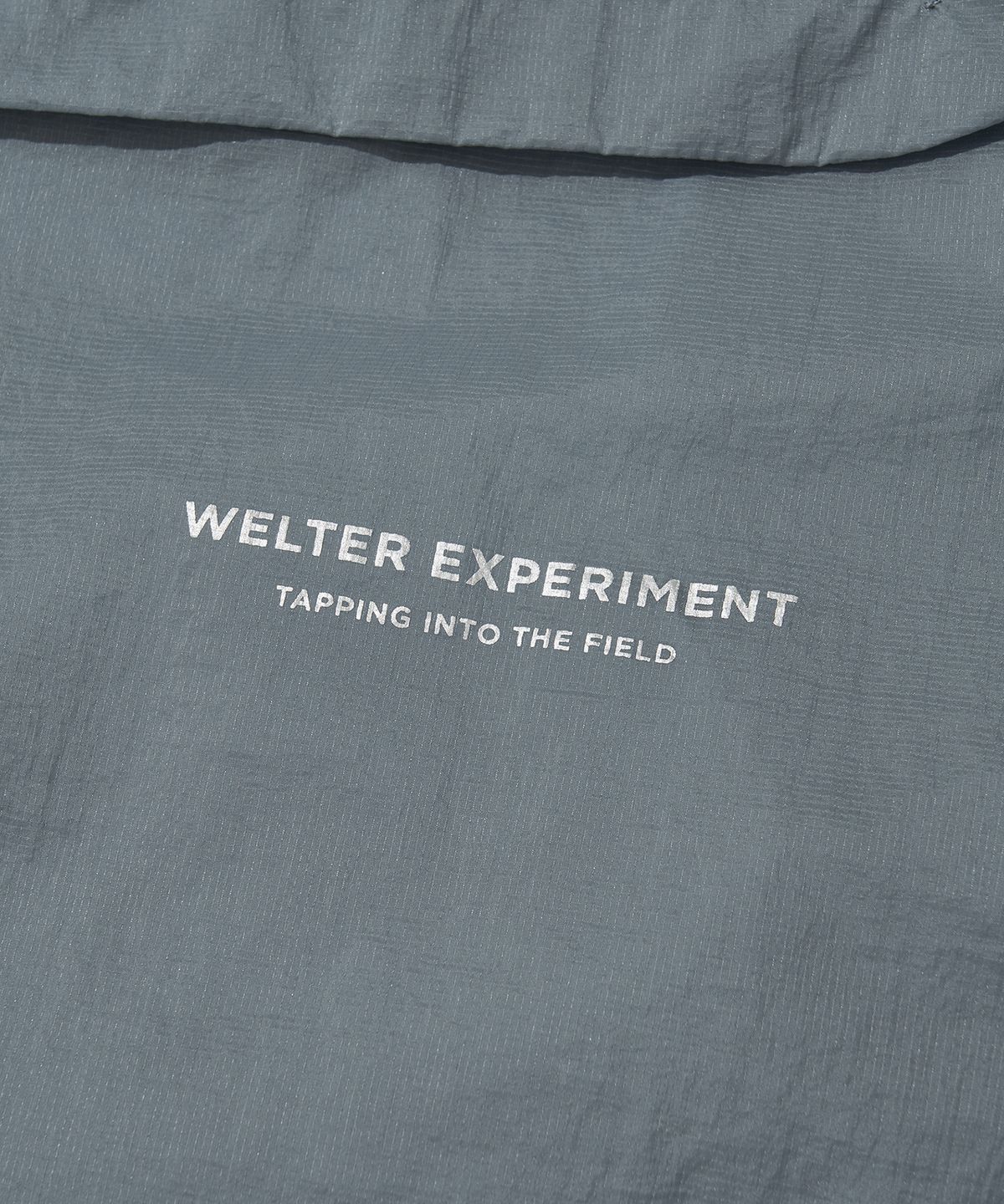 웰터 익스페리먼트(WELTER EXPERIMENT) NIMBUS AEROPACK WINDBREAKER_SKY BLUE