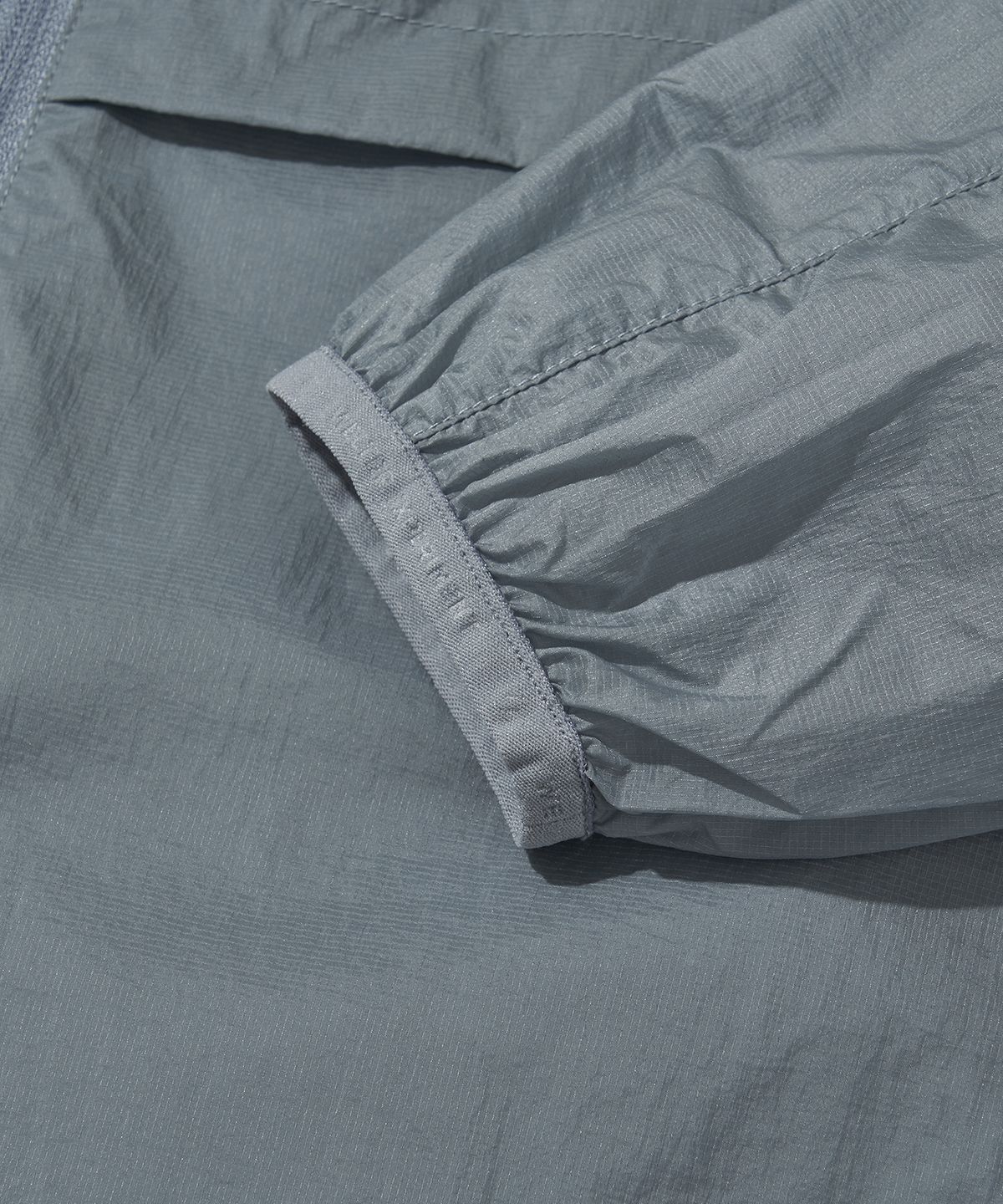 웰터 익스페리먼트(WELTER EXPERIMENT) NIMBUS AEROPACK WINDBREAKER_SKY BLUE