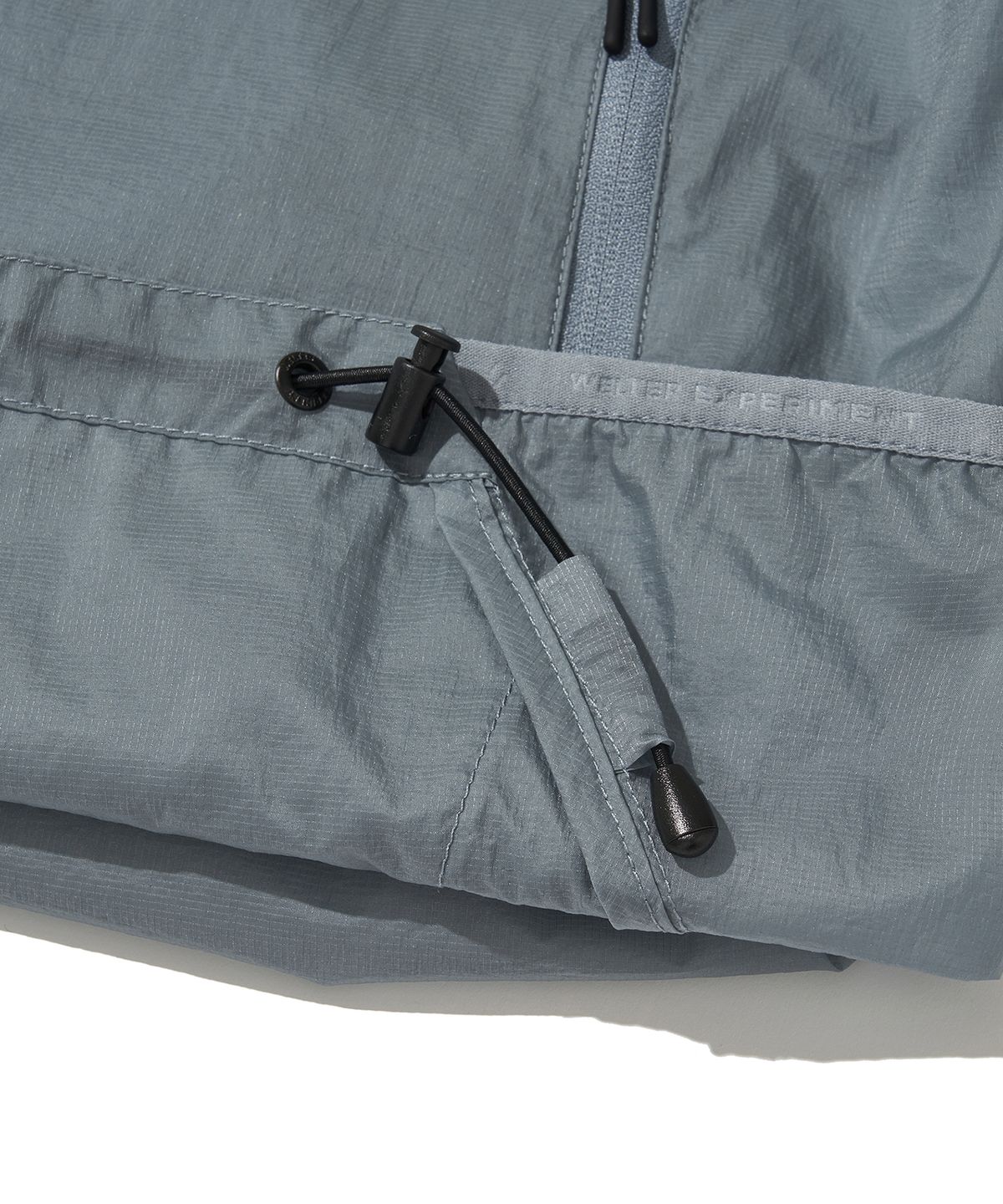 웰터 익스페리먼트(WELTER EXPERIMENT) NIMBUS AEROPACK WINDBREAKER_SKY BLUE