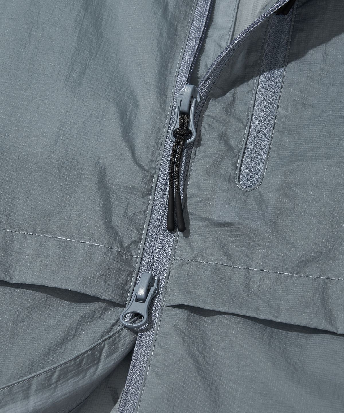 웰터 익스페리먼트(WELTER EXPERIMENT) NIMBUS AEROPACK WINDBREAKER_SKY BLUE
