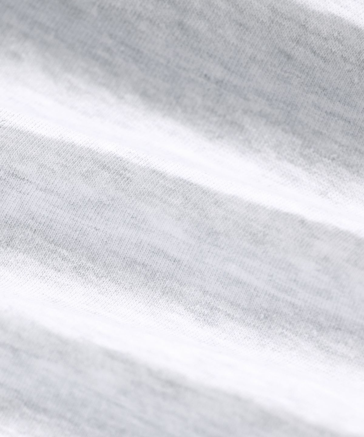 모더먼트(MODERMENT) 핀 로고 오버사이즈 반팔 티셔츠 [멜란지화이트]