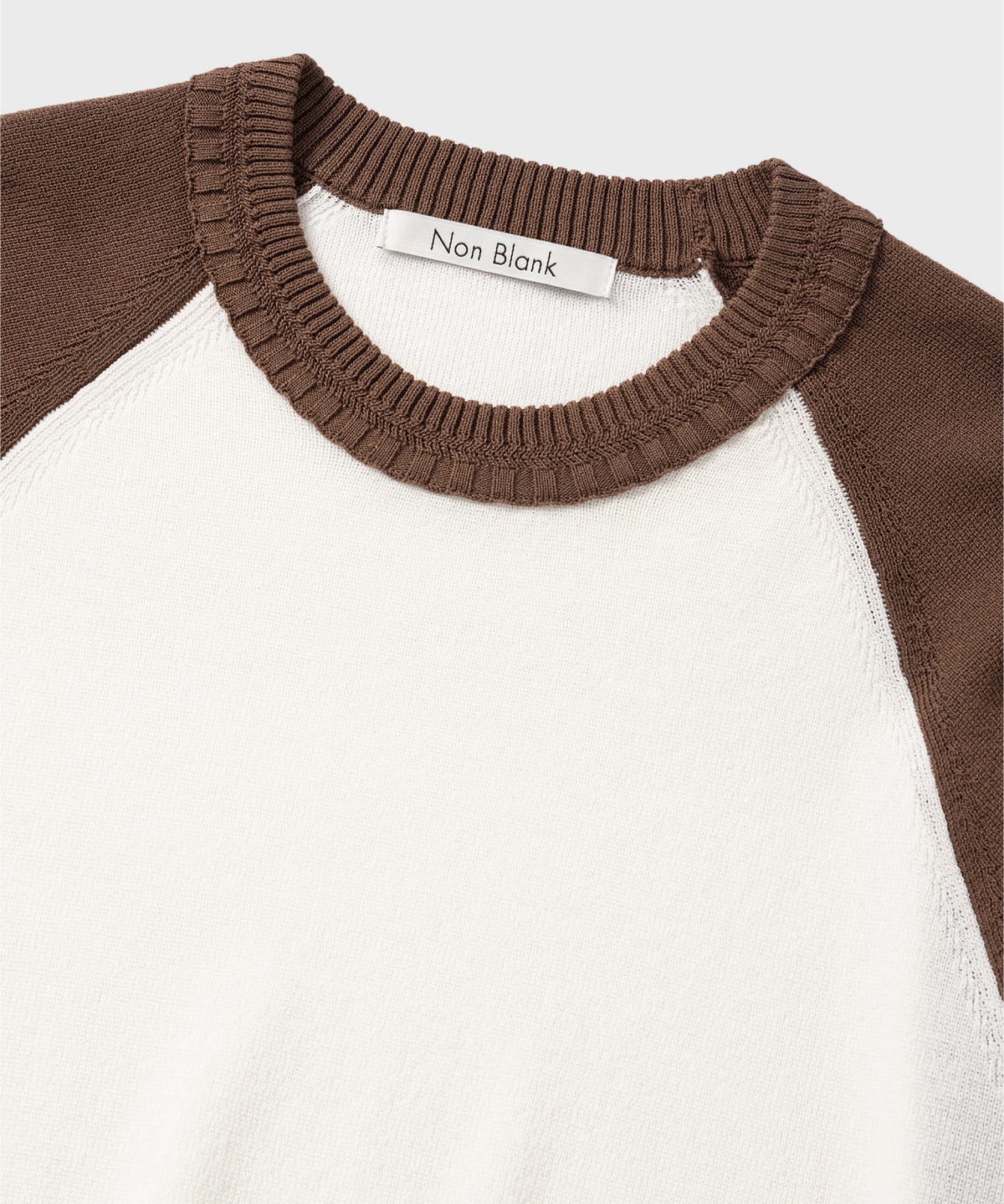 넌블랭크(NONBLANK) 래글런 HS 니트_IVORY/BROWN