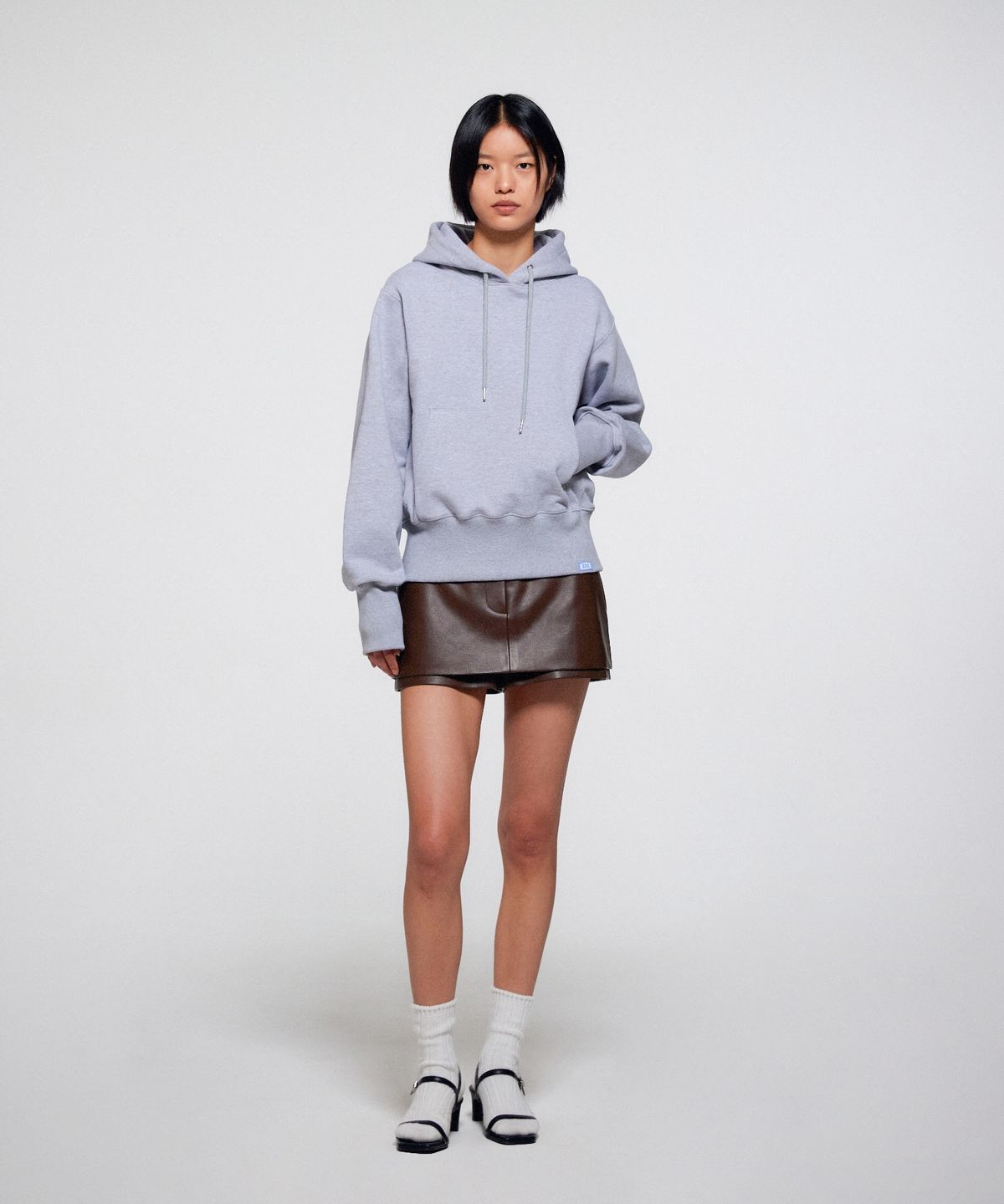 이알에이(ERA) FAUX LEATHER PANTS SKIRT - BROWN