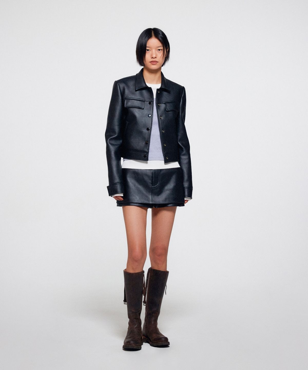 이알에이(ERA) FAUX LEATHER PANTS SKIRT - BLACK