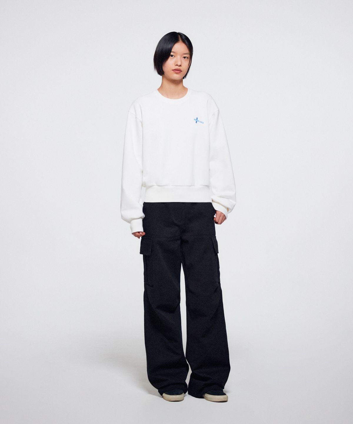 이알에이(ERA) WOMEN DIAGONAL CUT CARGO PANTS - BLACK