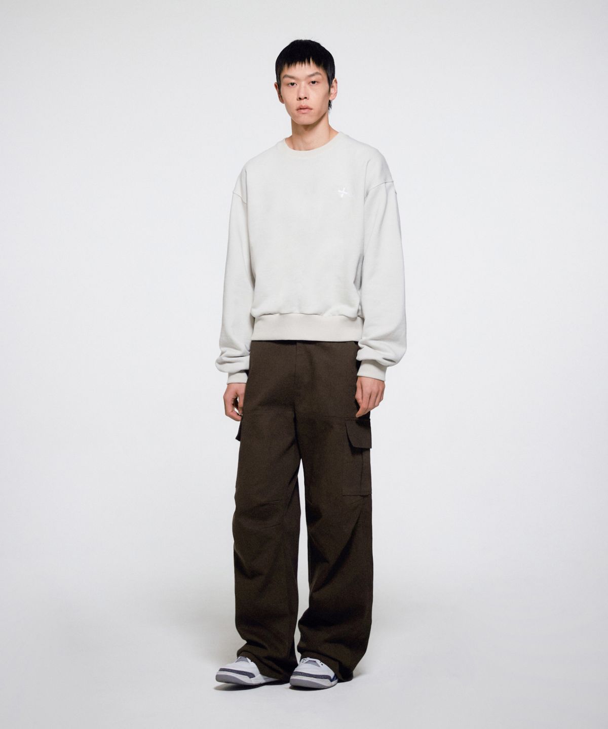 이알에이(ERA) MEN DIAGONAL CUT CARGO PANTS - BROWN