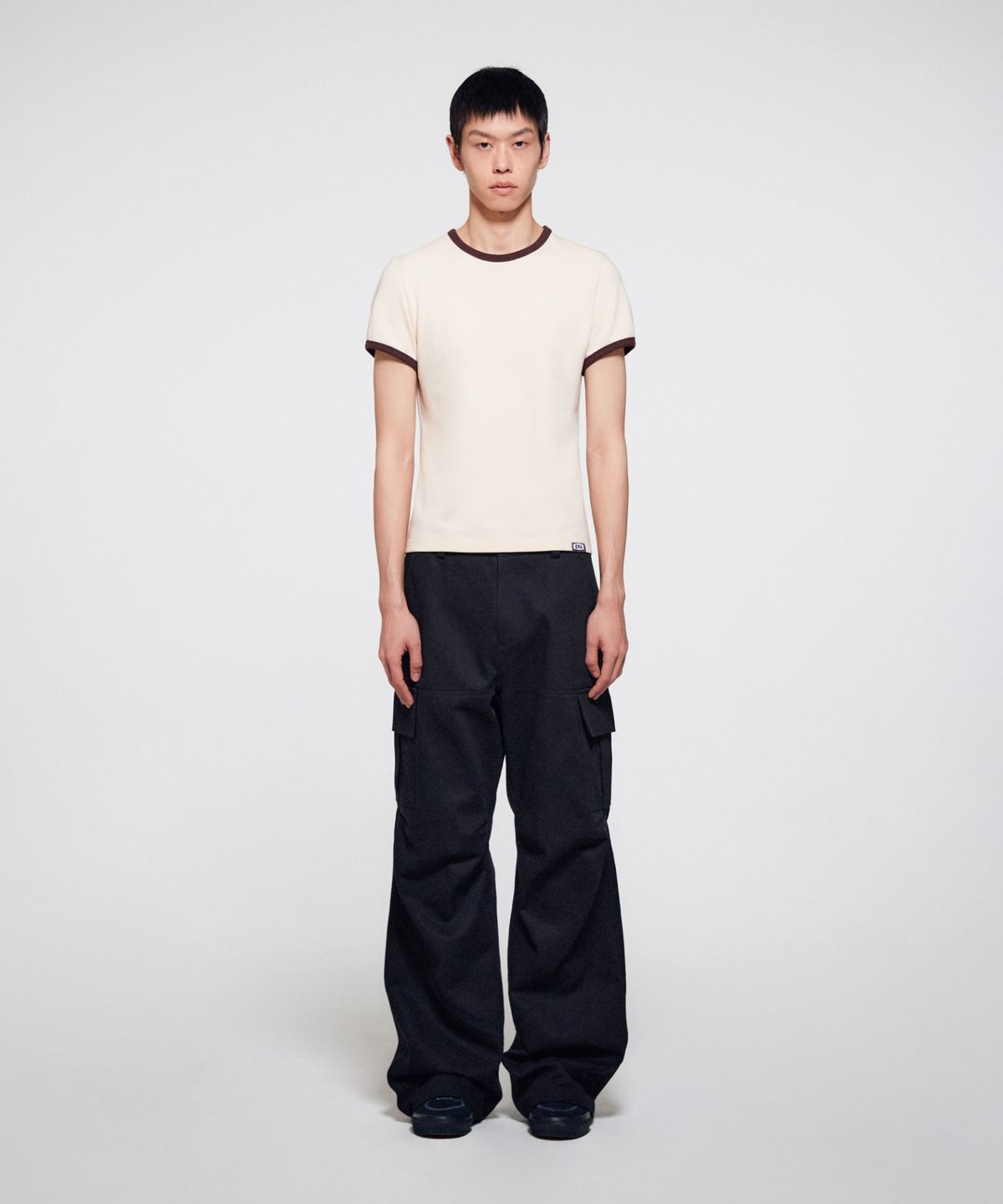 이알에이(ERA) MEN DIAGONAL CUT CARGO PANTS - BLACK